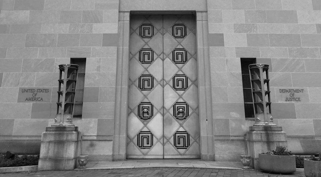 exterior photo of the doors at the Department of Justice